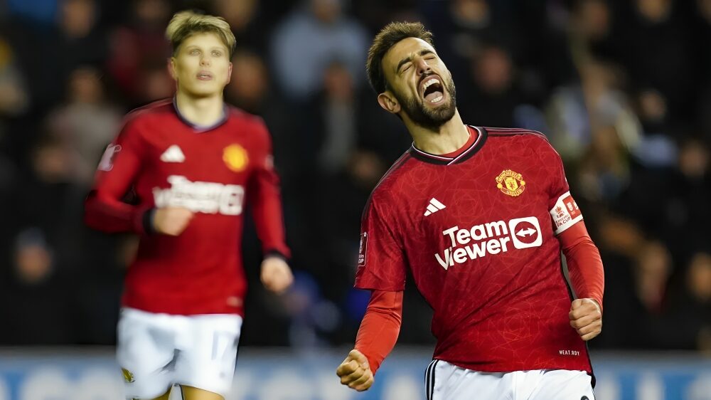 Bruno Fernandes celebrates scoring a penalty for Manchester United to go two nil up against Wigan Athletic