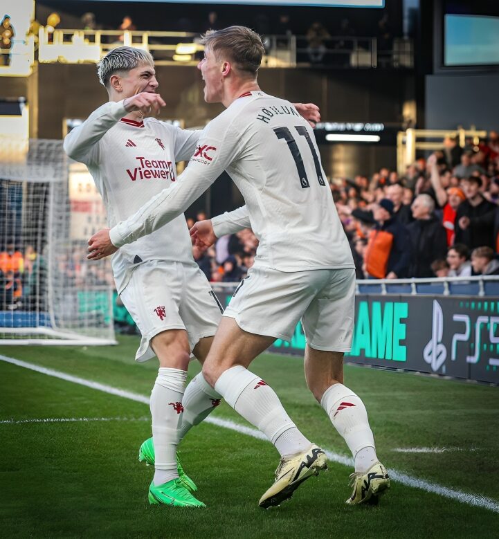 Rasmus Hojlund celebrates with Garnacho after putting Manchester United in the lead against Luton Town