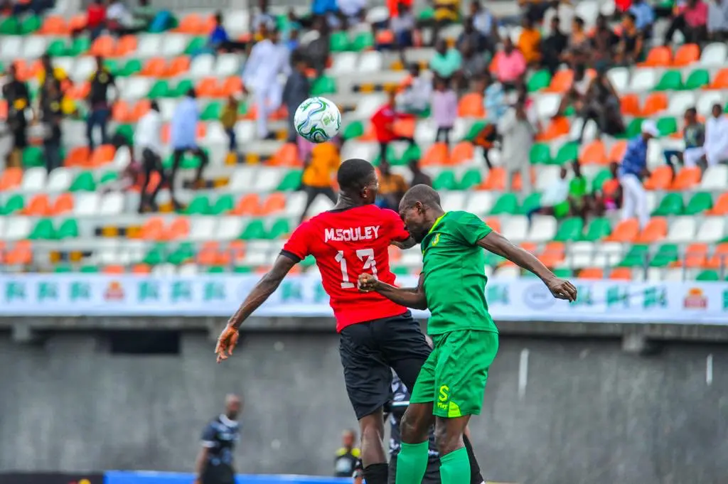 Katsina Defender heads away during the Naija Super 8 tourney