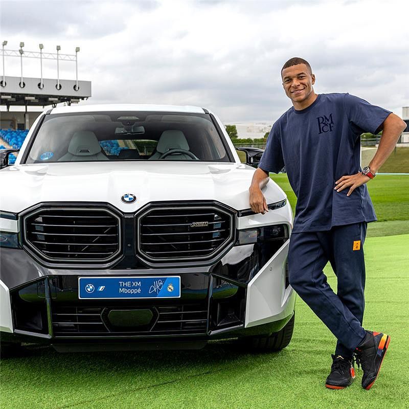 Kylian Mbappe opted for a sleek white BMW XM