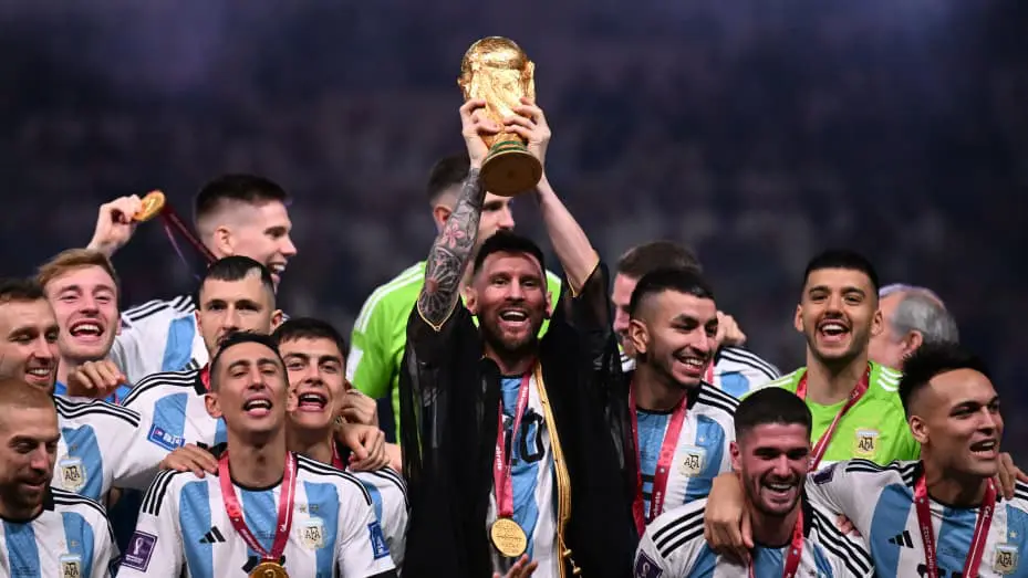 lionel messi lifts the fifa world cup as argentina win the world cup trophy