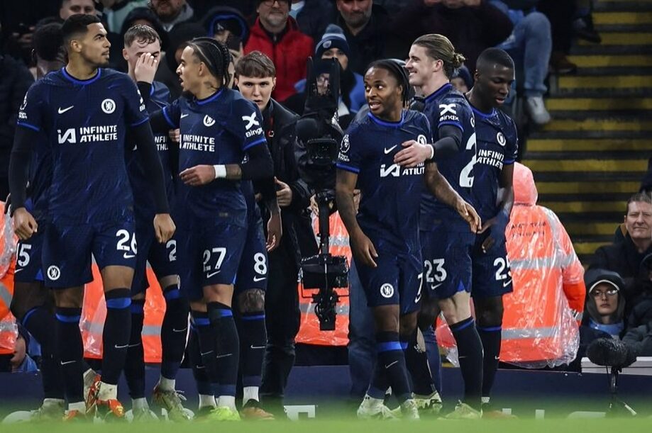 Chelsea team celebrates Sterling's goal against Manchester City